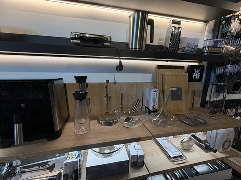 Mallorca, spain, april 20, 2026, kitchen appliances and houseware on store shelves, displaying modern cooking tools and serving items