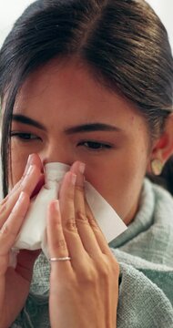 Sick, sneeze and woman in house with tissue, influenza and cold congestion in allergy season. Health, virus and person in home with paper napkin, blowing nose and viral flu in wellness risk.