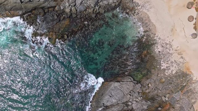 Aerial Top View Of Hidden Beach At Punta Pite Chile Turquoise Water Rocky Cove Luxury Coast