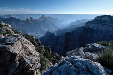 Fototapeta premium An expansive view from a rocky outcrop captures the vastness and beauty of undulating mountain ranges, inspiring a sense of adventure and wonder.