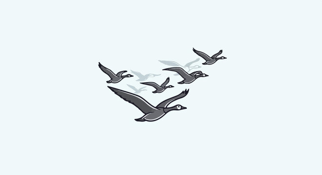 Flock of gray geese in flight against a light blue background
