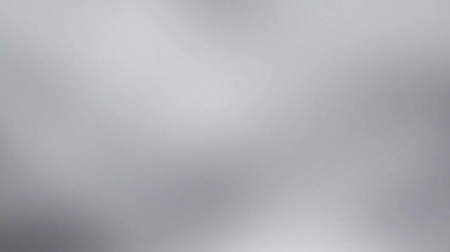 Grey and silver blurred gradient loop. Abstract futuristic background with a clean holographic glow and liquid wavy texture. Suitable for app background and modern wallpaper