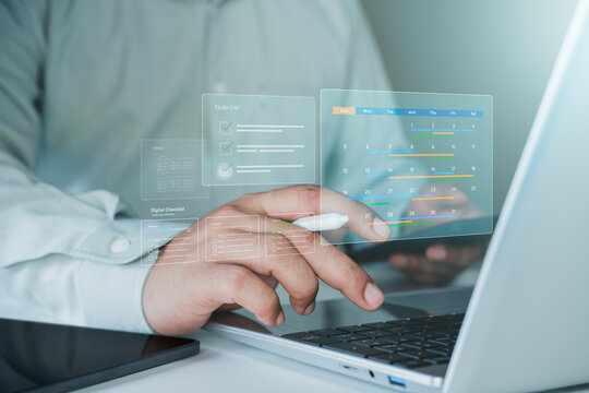 Businessman Using Digital Gantt Chart for Project Planning and Task Management on Laptop Interface, schedule management, productivity timeline, workflow, digital interface, project planning system