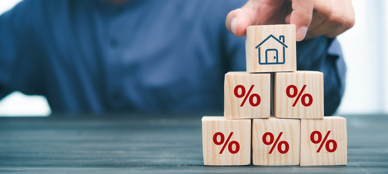 Property rates and real estate interest, interest rates, inflation, mortgage loans, tax increases. Increasing interest rates concept.