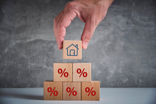 Property rates and real estate interest, interest rates, inflation, mortgage loans, tax increases. Increasing interest rates concept.