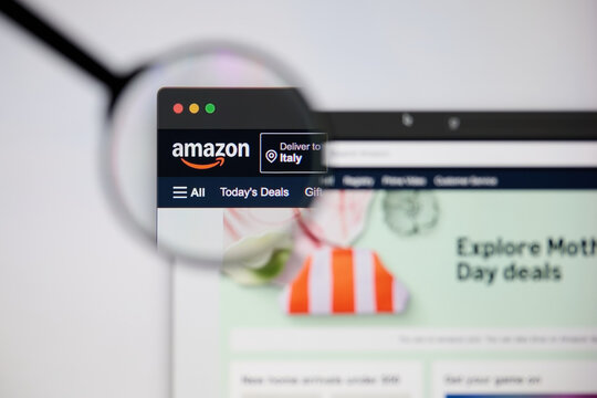 Milan, Italy - 2026, 20 Apr: Amazon logo displayed under a magnifying glass on laptop screen displaying the Amazon&rsquo;s website.