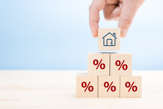 Property rates and real estate interest, interest rates, inflation, mortgage loans, tax increases. Increasing interest rates concept.