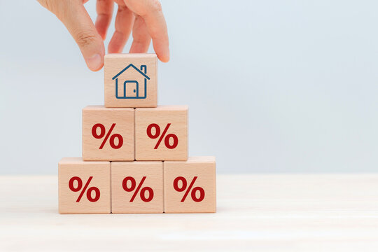 Property rates and real estate interest, interest rates, inflation, mortgage loans, tax increases. Increasing interest rates concept.