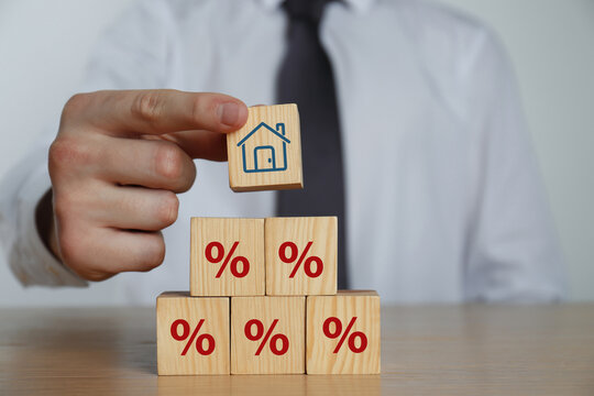 Property rates and real estate interest, interest rates, inflation, mortgage loans, tax increases. Increasing interest rates concept.