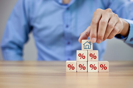 Property rates and real estate interest, interest rates, inflation, mortgage loans, tax increases. Increasing interest rates concept.