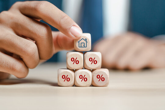 Property rates and real estate interest, interest rates, inflation, mortgage loans, tax increases. Increasing interest rates concept.