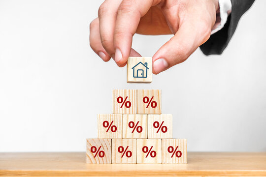 Property rates and real estate interest, interest rates, inflation, mortgage loans, tax increases. Increasing interest rates concept.