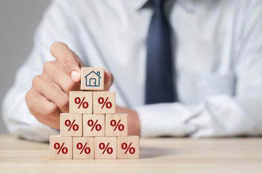 Property rates and real estate interest, interest rates, inflation, mortgage loans, tax increases. Increasing interest rates concept.