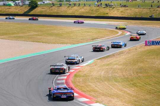 Oschersleben, Germany, May 28, 2023: Scenic view battle fast Mercedes BMW Audi Lamborghini Ferrari Porsche DTM at Oschersleben Motorsport Arena race track. European motors auto sport competition