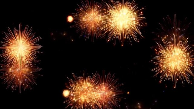 Slow motion view of multiple fireworks exploding and radiating across black night sky during outdoor celebration display