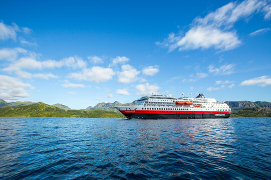 Hurtigruten's MS Finnmarken approaching the narrowest fjord in Norway, Trollfjord