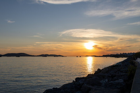 Istanbul Kartal Coast Sunset with Fishermen Silhouettes, Sea of Marmara and Princes Islands, Turkey