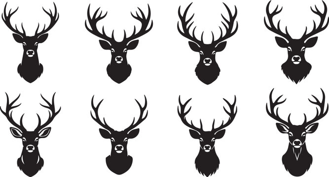 Collection of deer head silhouettes with antlers on white