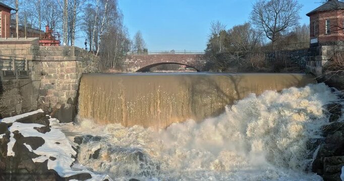 Vanhankaupunginkoski, a historic waterfall and dam located where the Vantaa River flows into the sea in Helsinki, Finland, Europe.