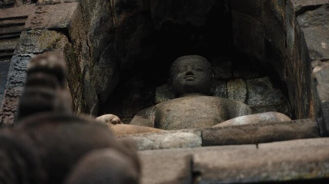 Cinematic footage of the iconic Borobudur Temple in Indonesia. Majestic stone stupas, ancient carvings, and serene atmosphere create a powerful spiritual and cultural scene.