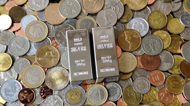 A silver bar, white metal against a backdrop of money, as a concept for the sales market. A silver bar as a background for your design