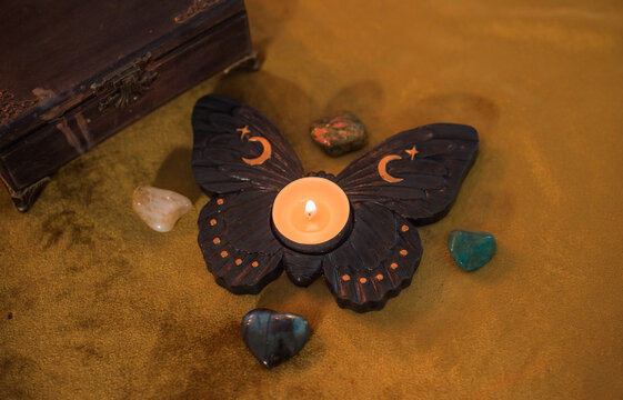 Altar on a velvet a candle and other stuff. Practical magic, wiccan or pagan illustration