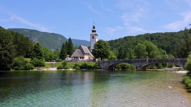 Church of St John the Baptist and Stone Bridge at Lake Bohinj, Slovenia