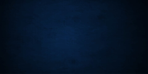 Fototapeta premium A dark blue grunge background features a textured vintage canvas design with a rough paper wall pattern and deep purple textile material for an old artistic backdrop