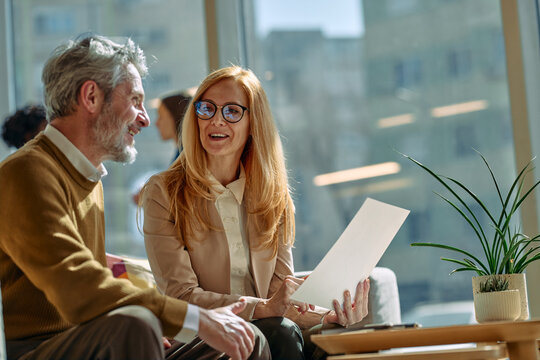 Business partners discussing strategy in modern office