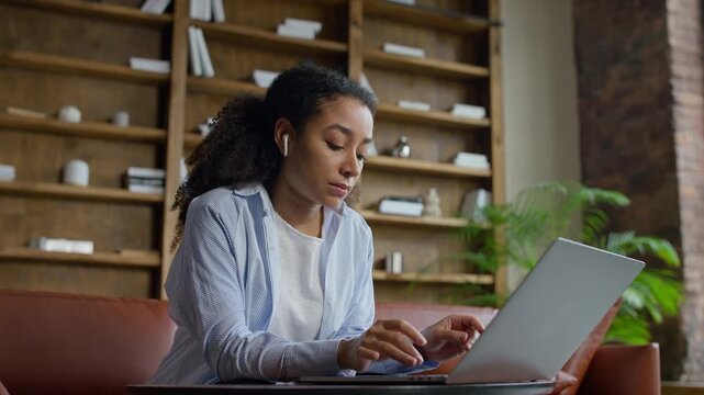 Lawyer assistant working on laptop at home