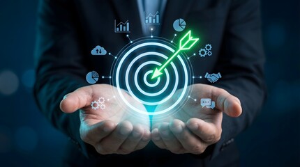 Fototapeta premium Augmented reality bullseye target with a green arrow hitting the mark hovering over open hands of a professional in a navy suit, featuring a luminous array of business performance icons.