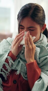 Sick, sneeze and woman in lounge with tissue, influenza and cold congestion in allergy season. Health, virus and person in house with paper napkin, blowing nose and viral flu with wellness risk.