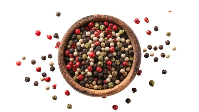 Wooden bowl filled with mixed peppercorns pink green, and black
