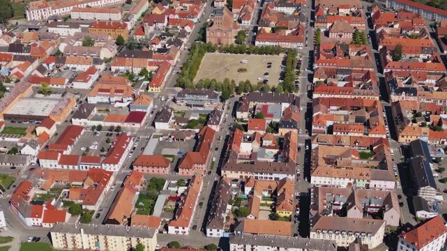 Aerial view of the old historic part of the city Neuf-Brisach in France on a late sunny day in summer. Pan to the left from beside.