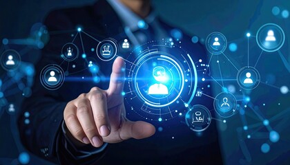 Fototapeta premium Man in dark suit interacts with blue, glowing digital interface with person icons