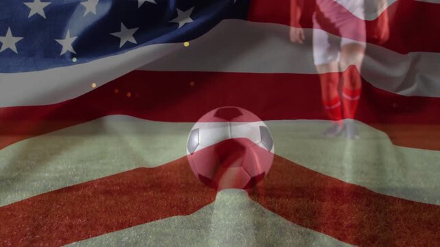 Soccer ball on ridge while man coming and kicking, sending ball rolling ahead under US-flag overlay