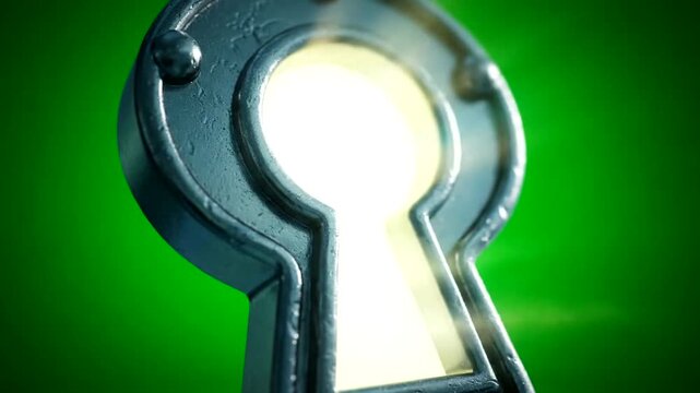Close-up of metal keyhole shining bright.