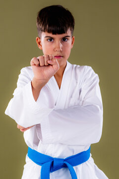 Close-up of a karate student executing a punch, highlighting fist alignment and precision in Shotokan training.