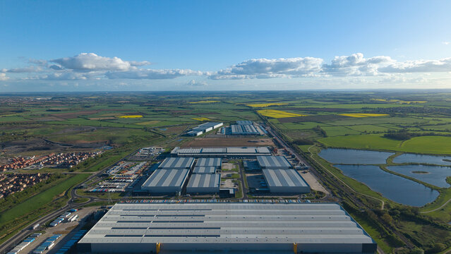 Aerial view of massive industrial business park and logistics distribution centers near Doncaster, UK