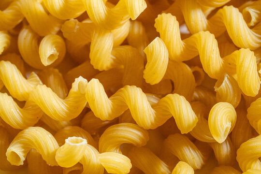 Close up of uncooked Cavatappi pasta 