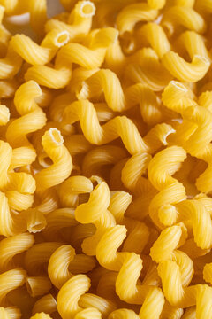 Close up of uncooked Cavatappi pasta 