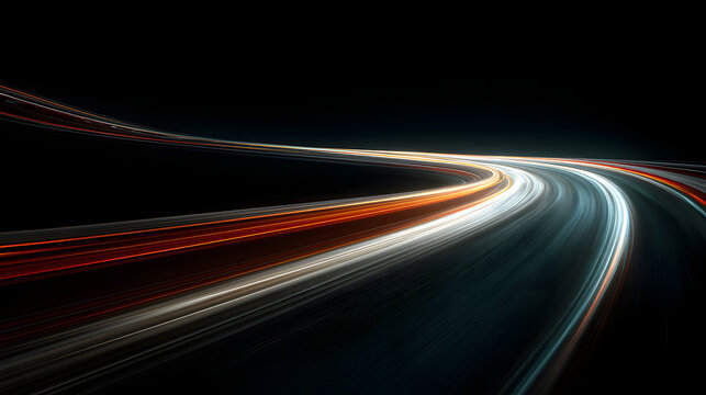 Dynamic light trails from moving vehicles on a curved road at night long exposure photography