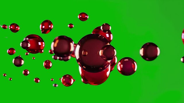 A versatile 3D animation of red liquid spheres floating and interacting, isolated on a chroma key green screen. This asset is perfect for compositing and allows users to easily remove the background f