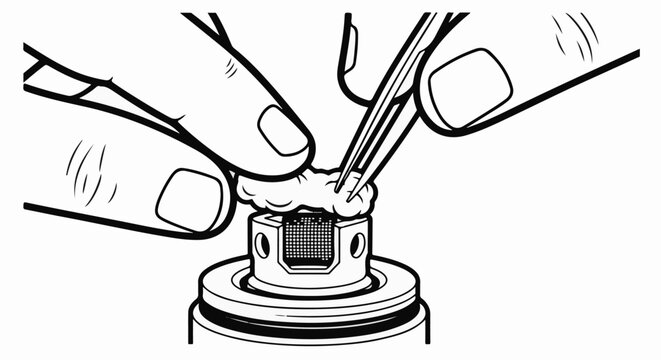 Close-up of hands using tweezers to adjust cotton on a vape coil