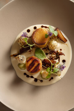 Luxury vegetarian tasting meal on ceramic design plate, high level serving.