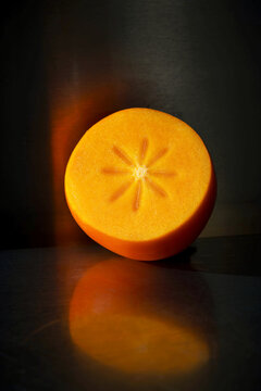 persimmon fruit with reflection
