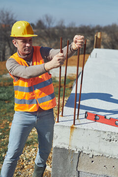 Construction worker working outdoors on a construction site.