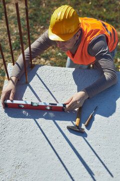 Construction worker working outdoors on a construction site.