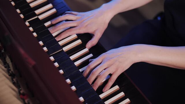 Hands Playing Antique Double-Manual Harpsichord