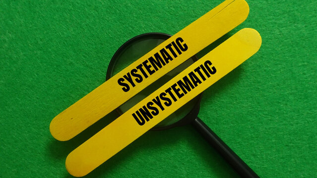 Magnifying glass shows systematic and unsystematic words